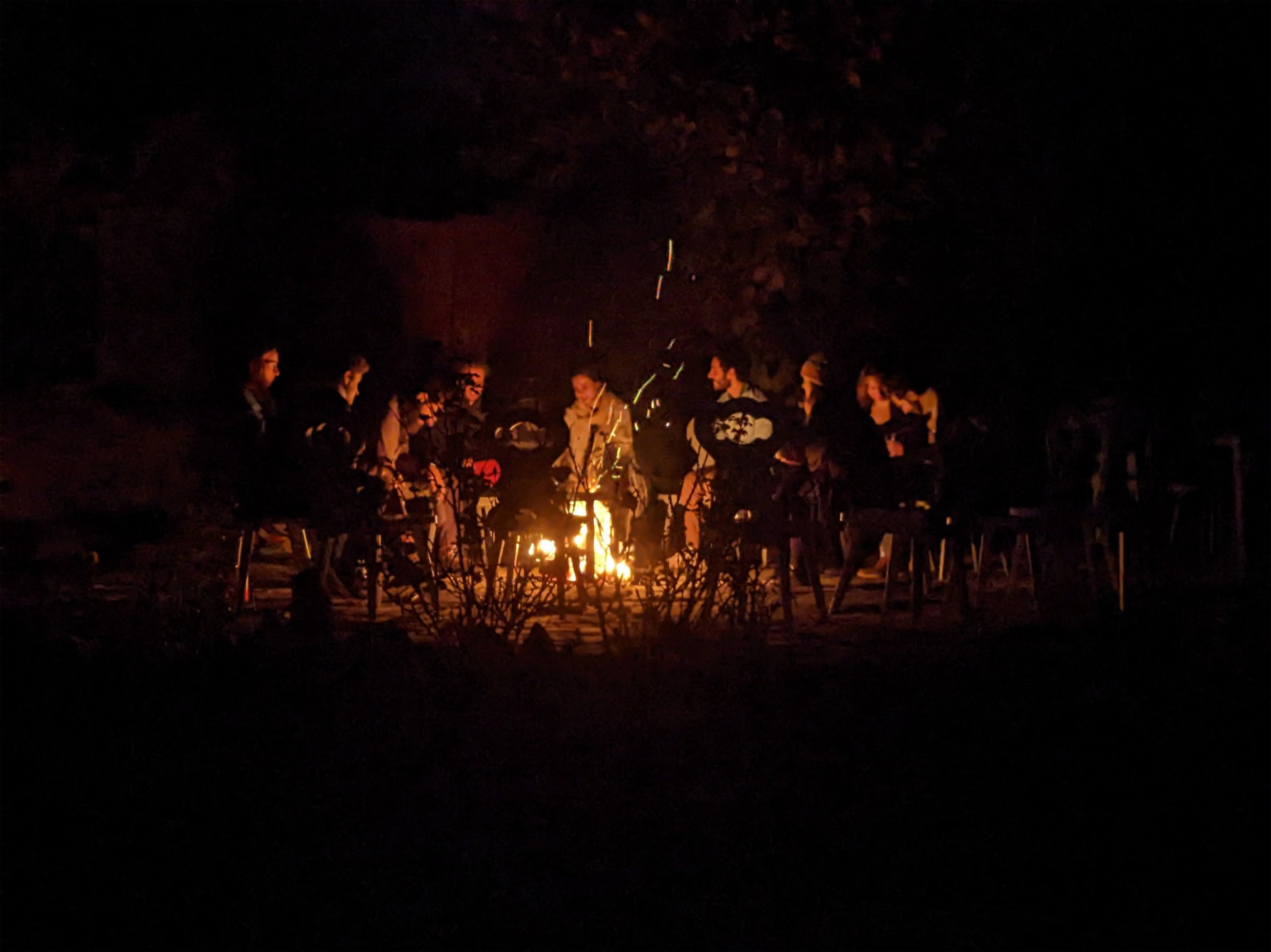 Around the fire after dark