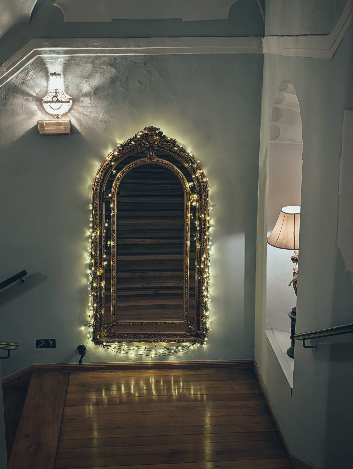 Corridor light, mirror with garland